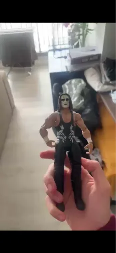 3 bonecos wwe