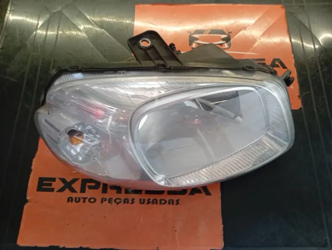 Farol direto Fiat uno Vivace 2009 a 2014 original