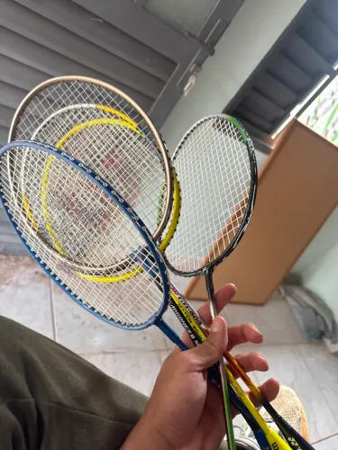Raquete de badminton