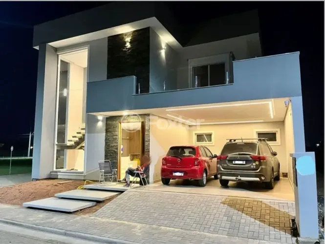 Vendo Excelente casa em condomínio 3 suítes 3 garagens 234m² privativos em Eldorado do Sul