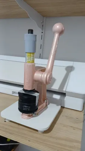 Máquina de bottons