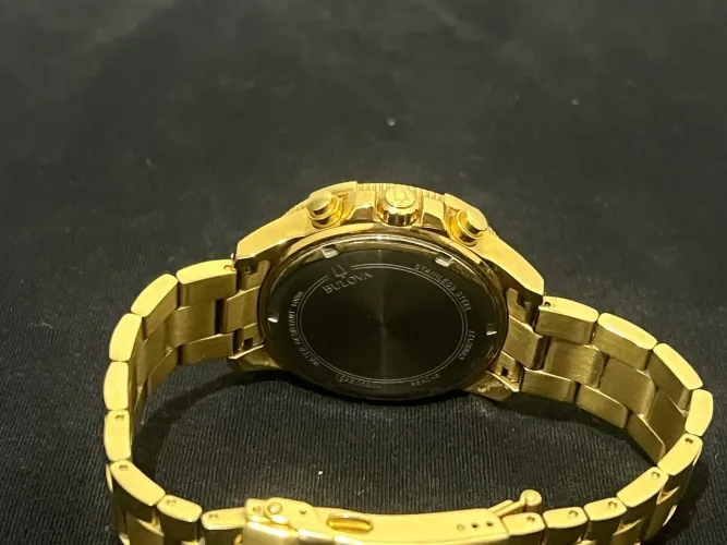 Relógio / bulova / dourado / nota de compra ..