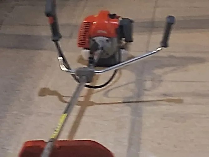 Máquina de cortar ? grama