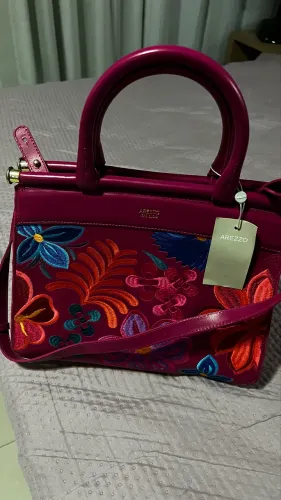 Bolsas femininas d couro 250,00 cada