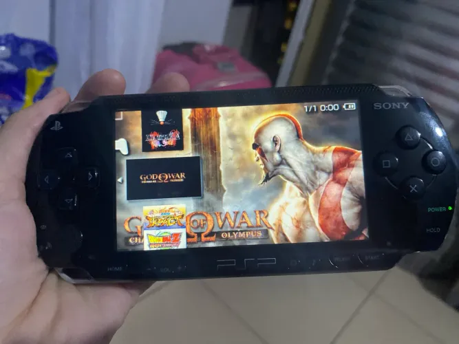 Psp em perfeito estado acompanha jogos e cartão de memória 