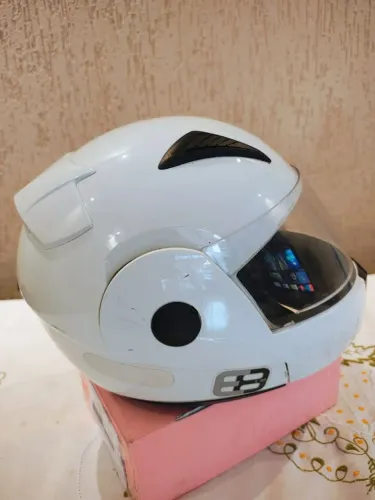 Capacete escamoteável 