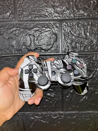 Controle Playstation 3 com detalhes Preto e branco
