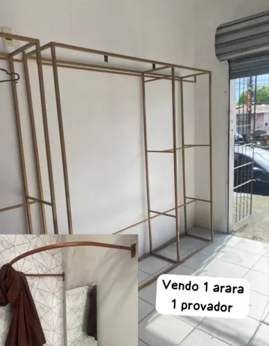 Arara pra roupa de loja