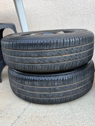 Vendo jogo com 4 pneus + rodas de ferro + calotas - 4x10, aro 14