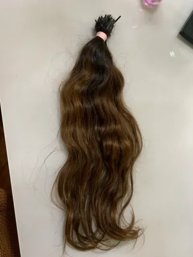 Cabelo humano , 120 gramas 65 centímetros.