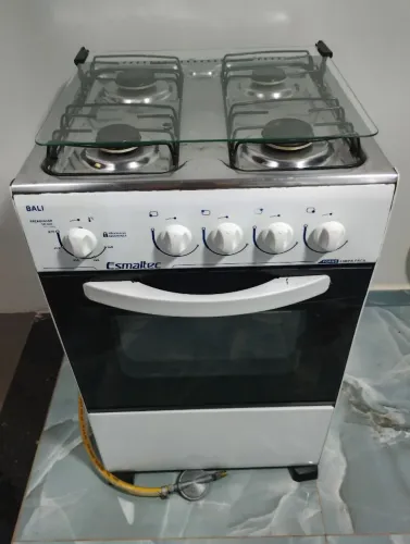 Fogão funcionando tudo entrego acompanhar mangueira e registro