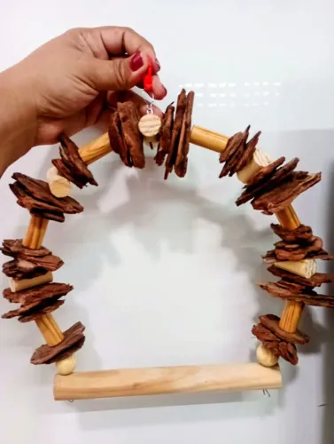 Brinquedo para calopsita 