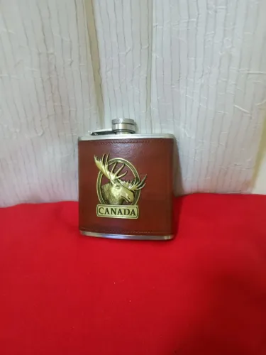 Cantil de bolso com design de alce e Canadá