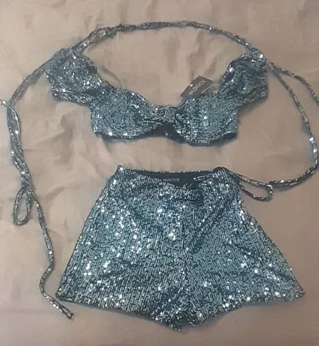 Conjunto feminino em paetê.Padocl