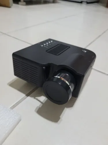 Mini projetor novo na caixa