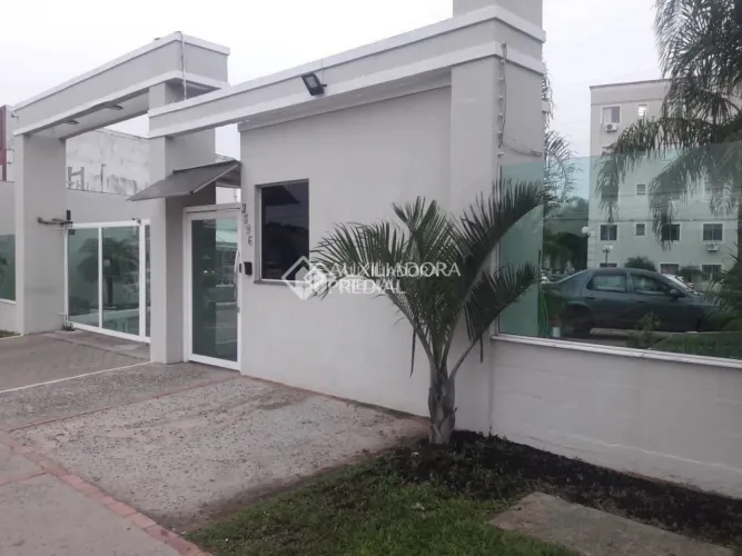 Apartamento com 2 quartos semi-mobiliado com 1 vaga de garagem em Porto Alegre - RS
