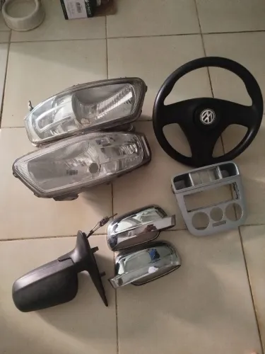 Faróis, volante, retrovisor, moldura Gol G4