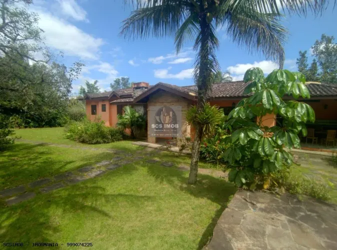 Casa de condomínio em Bertioga: Praia, Campo, Lazer!