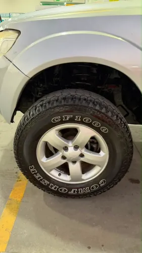 RODAS E PNEUS AT ARO 16 5X114 PAJERO TR4