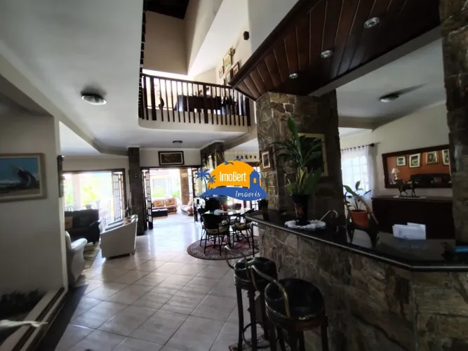 Luxuosa Casa em Condomínio Fechado Frente ao Mar em Bertioga-SP: 4 quartos, 4 suítes, 8 ba