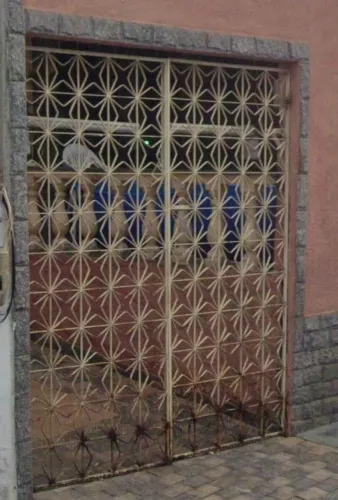 Portão de garagem e social de ferro maciço