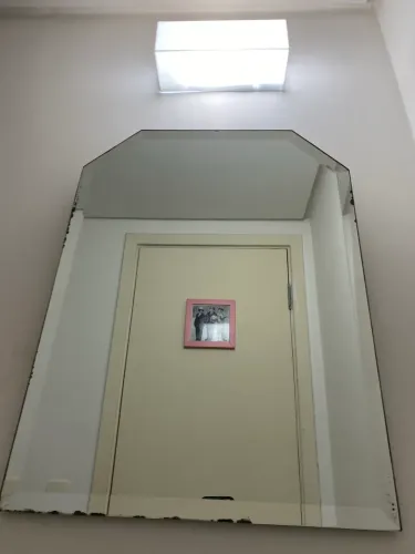 2 espelhos , um com moldura inox e outro bisotê 