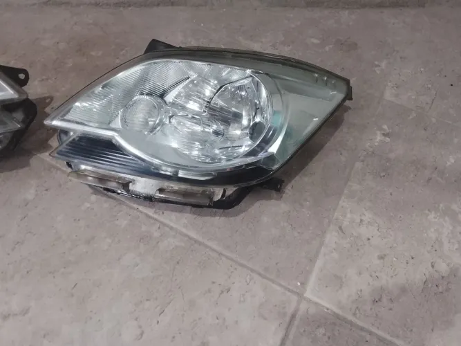 Farol esquerdo de Cobalt 2013/15 cromado original 