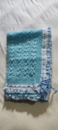 Manda de bebê de crochê azul 