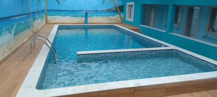 Casa de Praia completa com Piscina Aquecida, Churraqueira, Suítes em Peruíbe