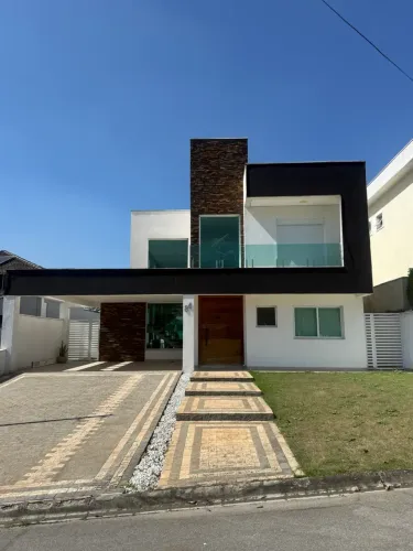 Casa de condomínio para aluguel com 380 metros quadrados com 4 quartos
