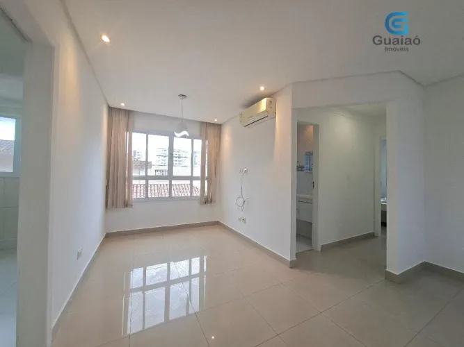 Alugo lindo Apartamento de 2 dormitórios, suíte e garagem demarcada na Aparecida em Santos