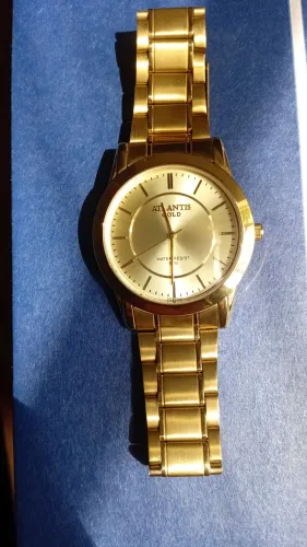 Vendo Relógio masculino analógico dourado