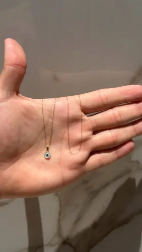 Corrente feminina com pingente olho grego ouro 18k