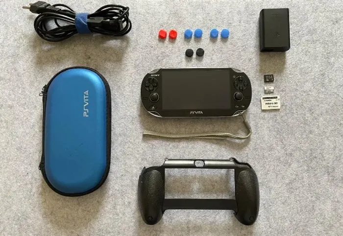 PS Vita Fat OLED (PCH-1010) Desbloqueado + 64GB + SD2Vita + Grip + Case + Acessórios Compl