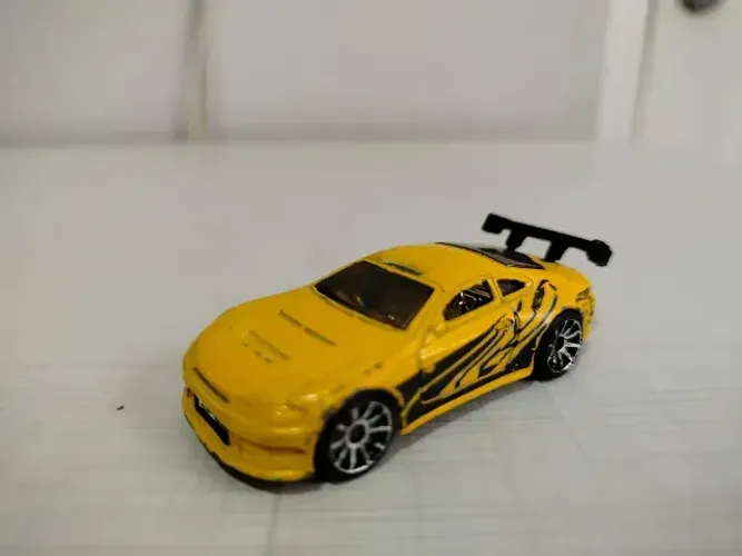 Miniatura Nissan Silvia S-15 Hot Wheels 1/64 Amarelo