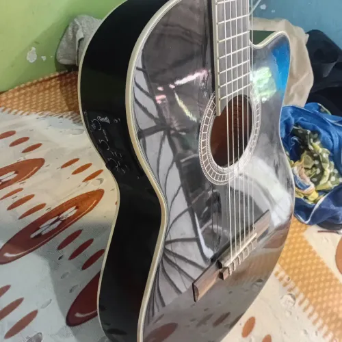 Vendo lindo violão elétrico tonante fino elegante estado de novo