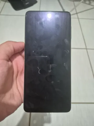 Celular M52 com fundo rachado, mas funcionando perfeitamente