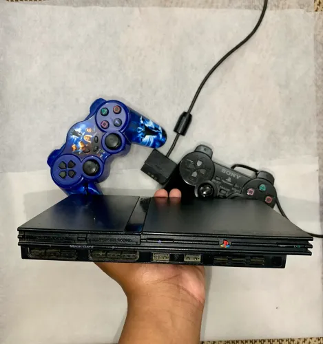 PlayStation 2 Slim Completo + 2 Controles + Álbum com Jogos