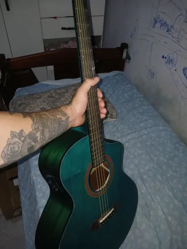 Vendo violão elétrico  azul da coral 