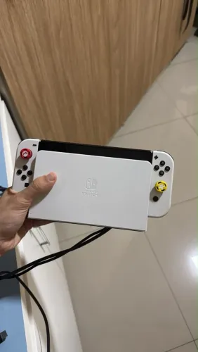 Vendo nintendo switch oled com case e proteção de analógico