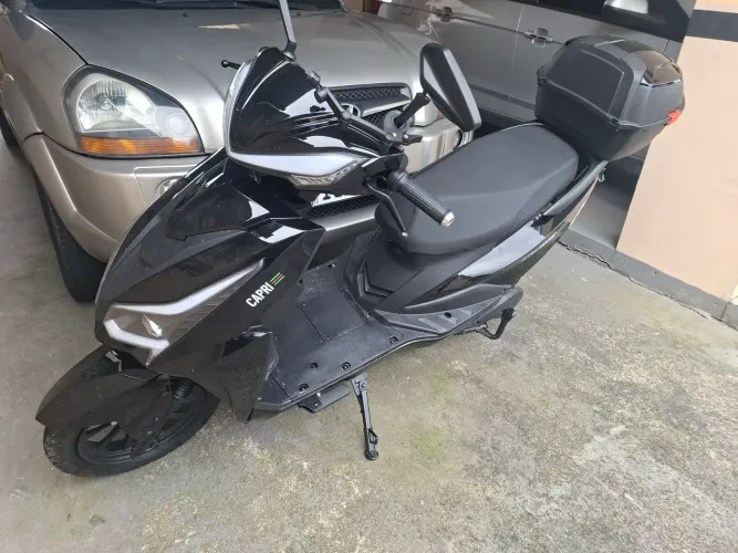 Moto eletrica Novinha menos de 1 mes de uso