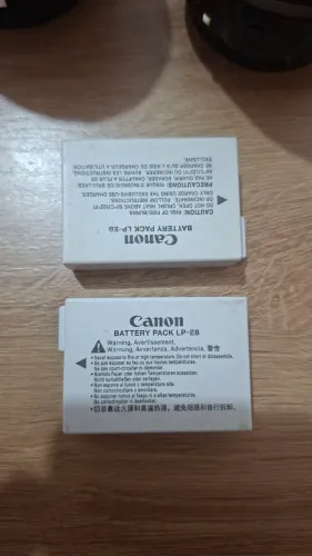 2 baterias Canon LP E8 (em bom estado) e 2 lentes cânon 18-55 (precisando de manutenção)