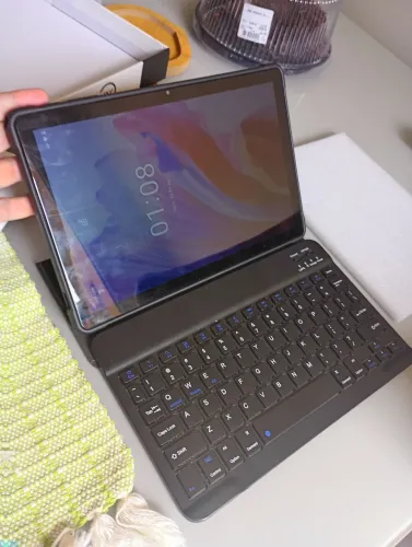 TABLET EXCELENTE PARA JOGOS E ESTUDO ACOMPANHA TECLADO CANETA E FONE CAIXA
