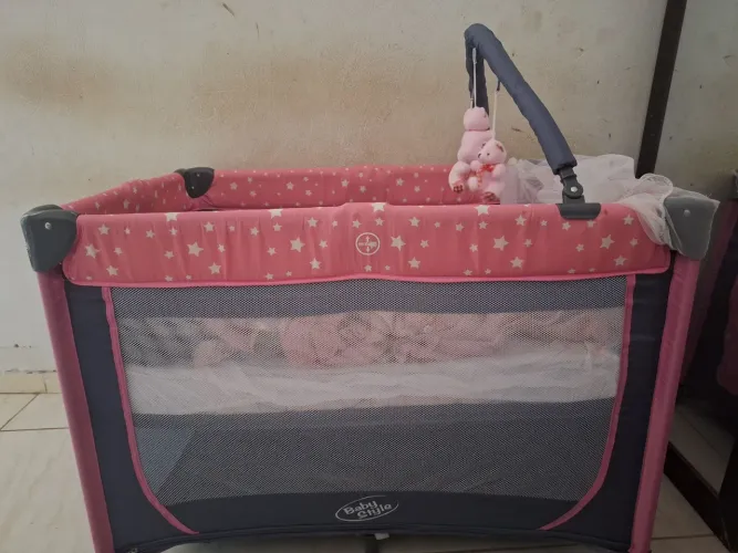 Berço portátil feminino