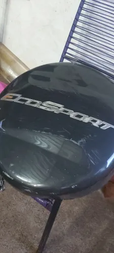 Capa do estepe ecosport com marcas de uso mas sem nenhum trinco 