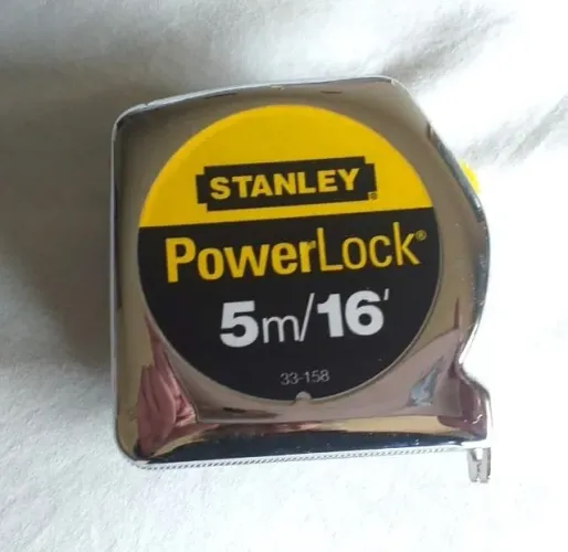 Trena marca Stanley 5m/16'. Cromada +2 1/2in/64mm. Nova.