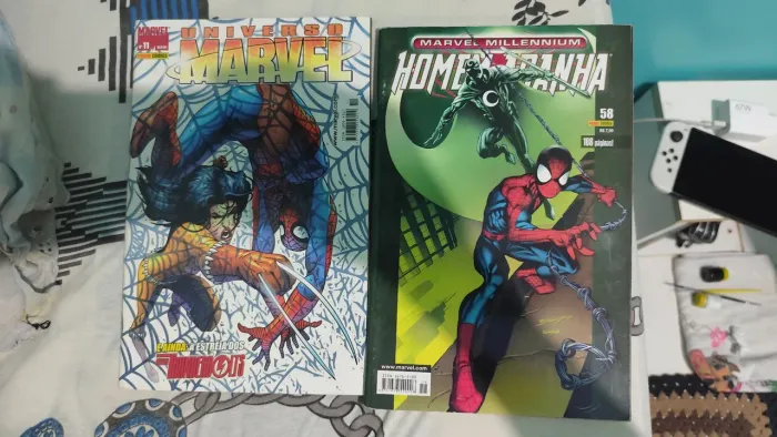 Duas hqs raras! Universo marvel 11 e Homem aranha Millenium 58