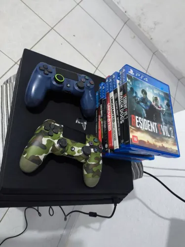 PS4 pro +2 controle e 8 jogos