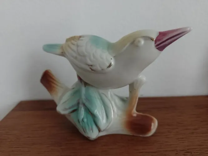 Pássaro de porcelana