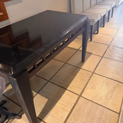 Mesa em ferro modelo de antiquário com tampo em granito